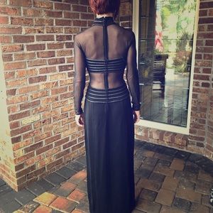 Black evening down with silver and sheer cuts